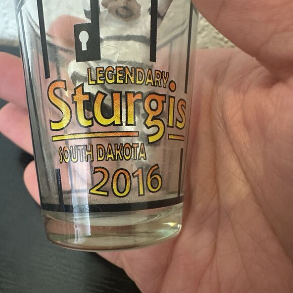 Shot Glass South Dakota Sturgis Biker Rally Jail Cell Inmate Striped Jumpsuit - Picture 2 of 3